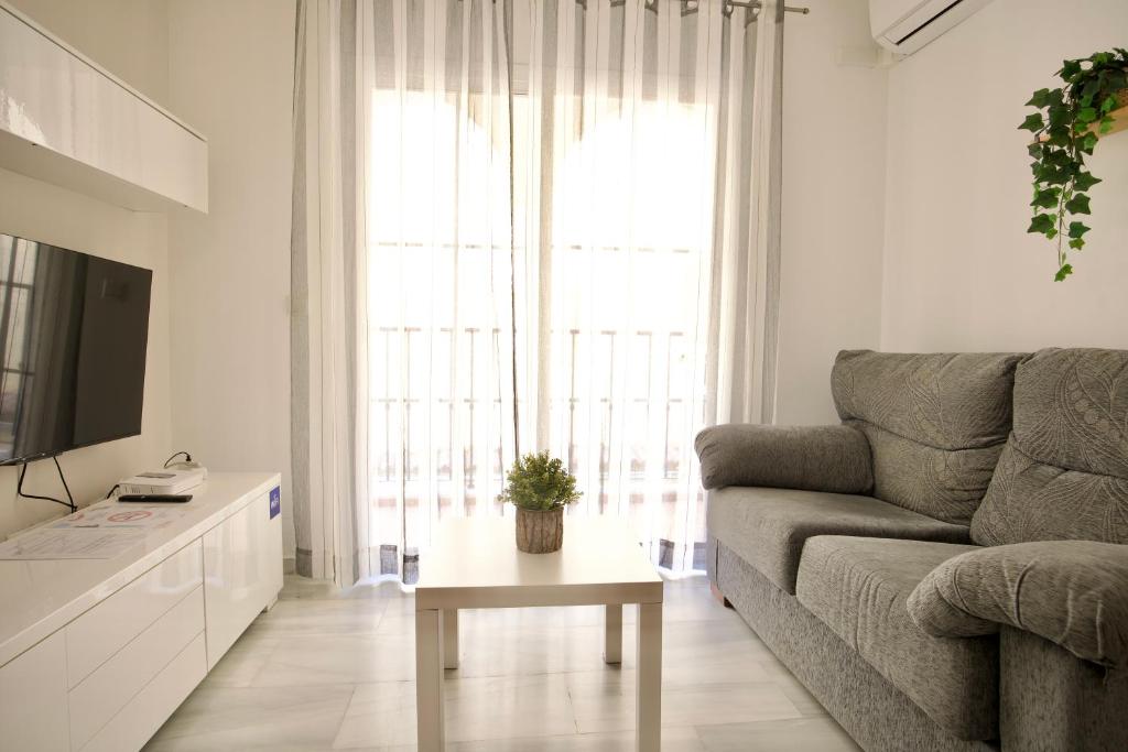 Televízia a/alebo spoločenská miestnosť v ubytovaní Bonito apartamento cerca de la playa de Torrox