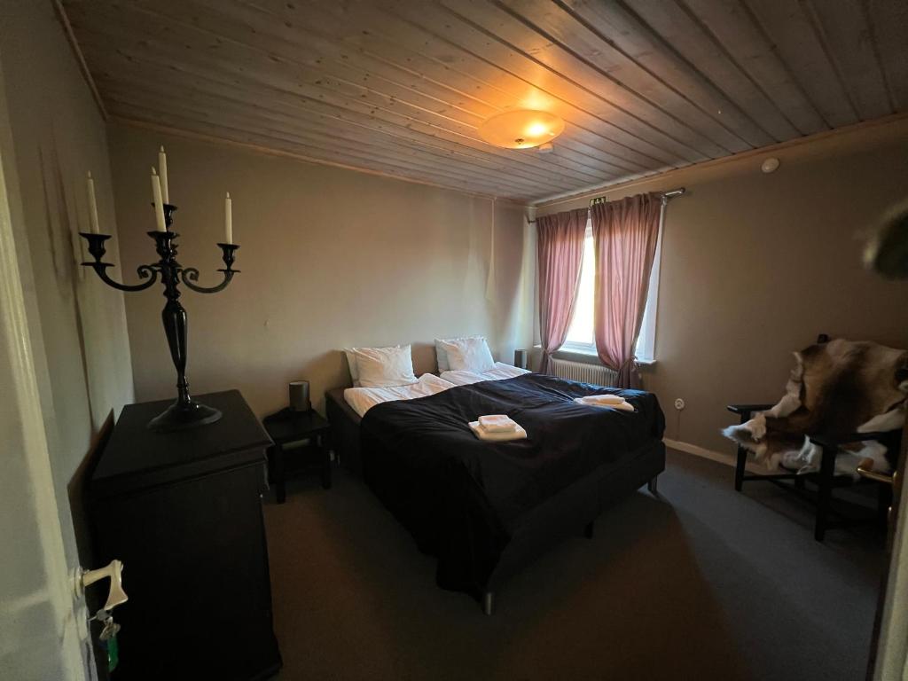 Una cama o camas en una habitación de Fjällstugan 29