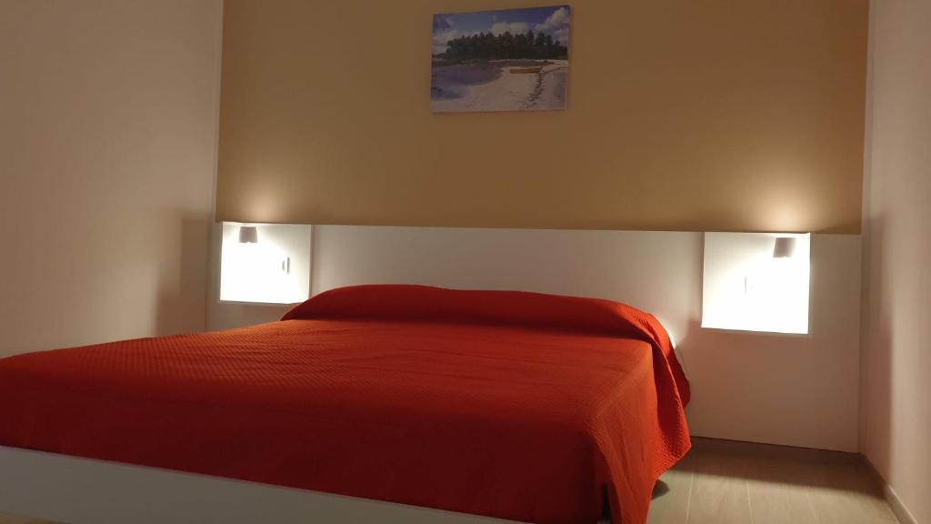Postel nebo postele na pokoji v ubytování B&B San Lorenzo