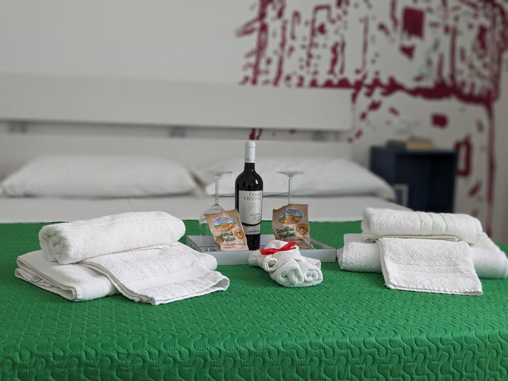 Postel nebo postele na pokoji v ubytování B&B EVO Nardò