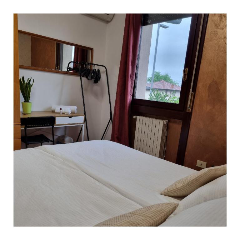 Postel nebo postele na pokoji v ubytování Orio Welcome