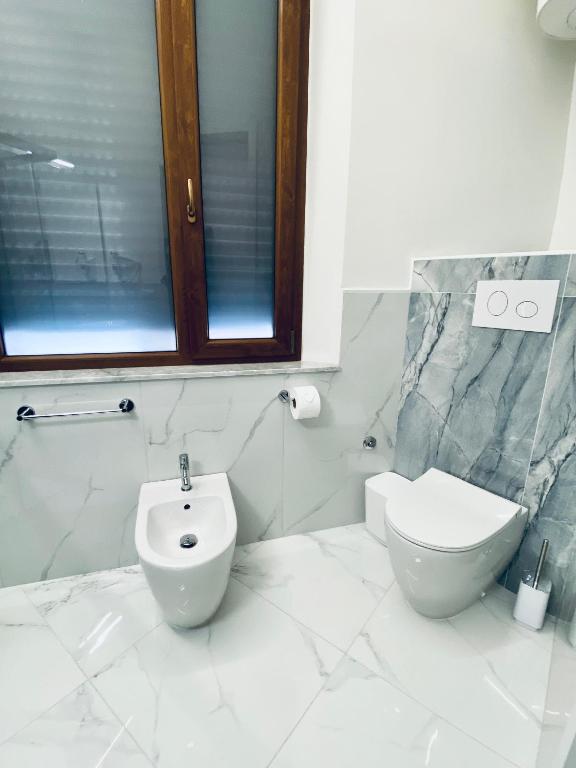 Koupelna v ubytování B&B Hèlios