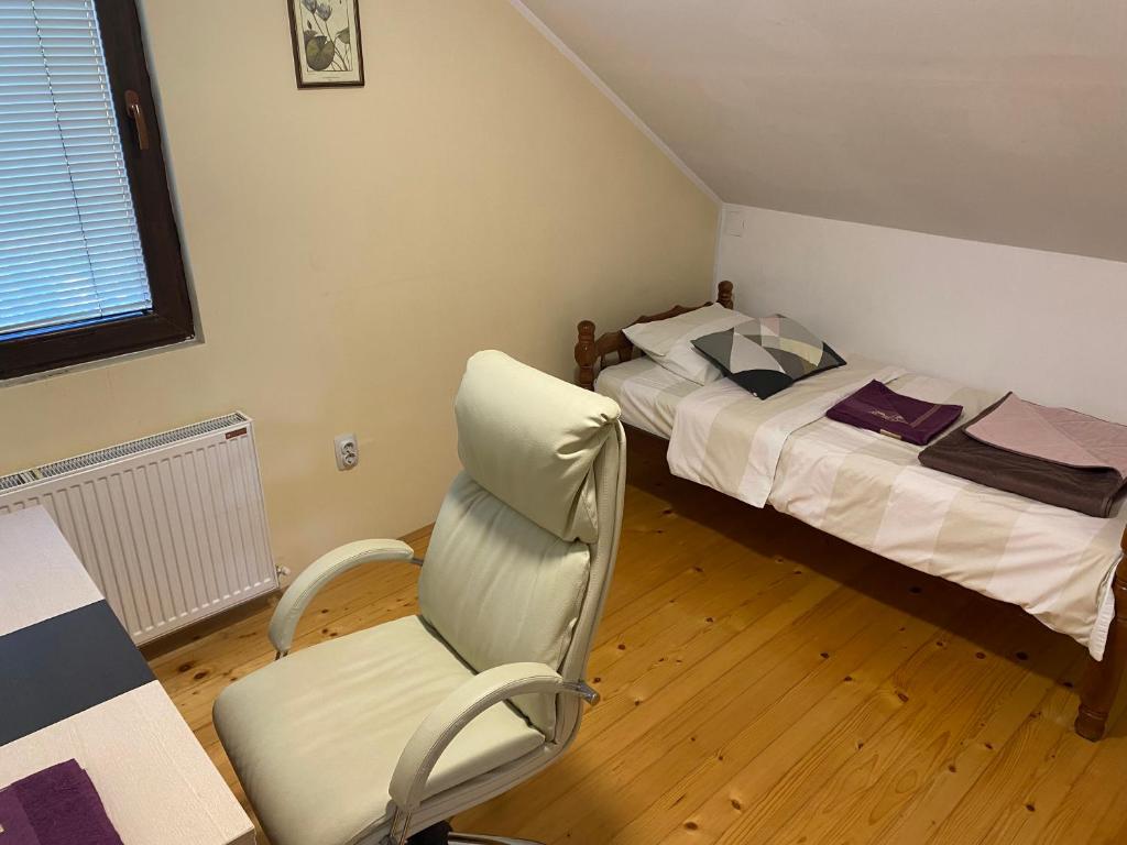 Postel nebo postele na pokoji v ubytování Apartman Jelena Sumarice