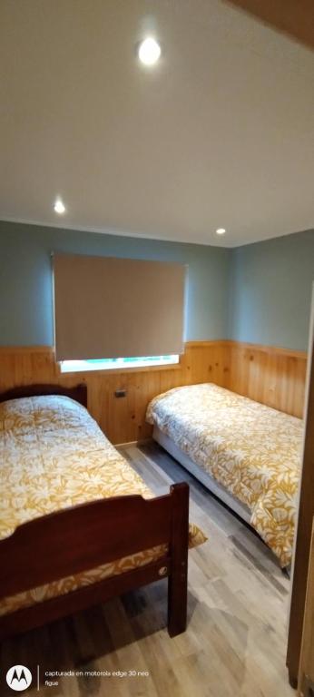 Postel nebo postele na pokoji v ubytování Cabaña Puyehue