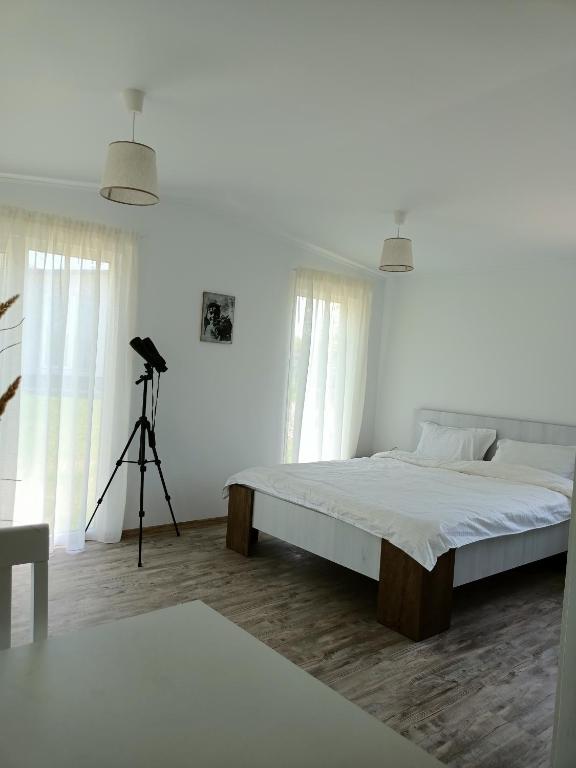 Postel nebo postele na pokoji v ubytování Greci GuestHouse
