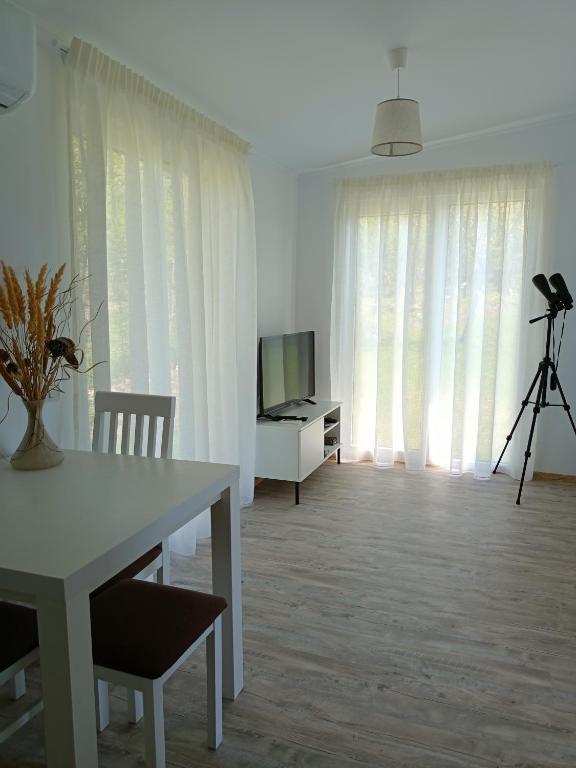 TV a/nebo společenská místnost v ubytování Greci GuestHouse