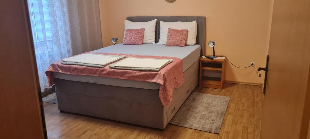 Postel nebo postele na pokoji v ubytování Apartments Bosnjak