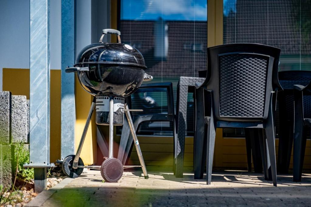 Gril dostupný pro hosty v apartmánu
