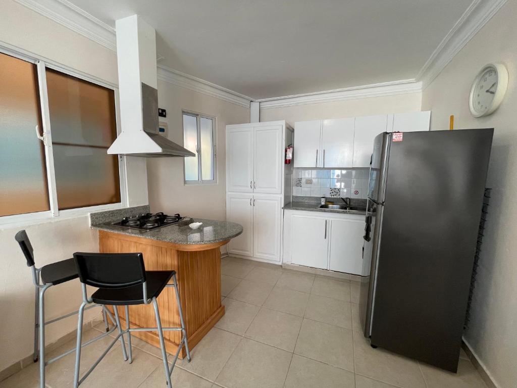 Kuchyň nebo kuchyňský kout v ubytování Karimar Beach Condo Hotel