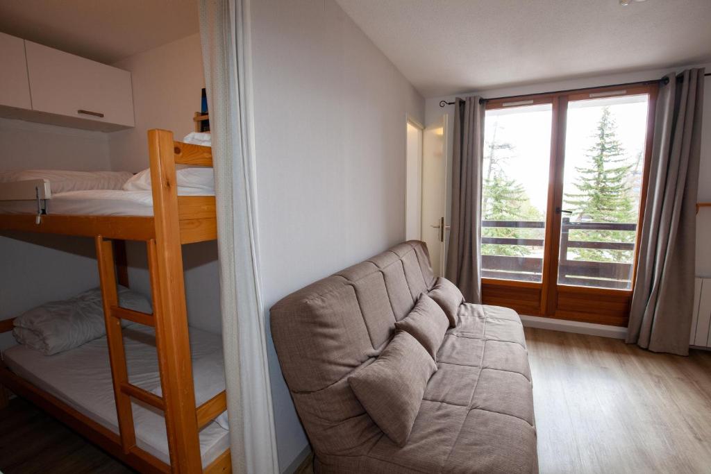 Posteľ alebo postele v izbe v ubytovaní Studio 24m2, 1 chambre pied des pistes