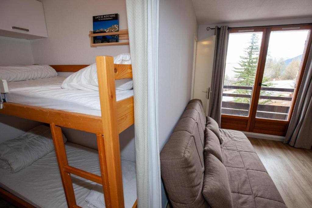 Posteľ alebo postele v izbe v ubytovaní Studio 24m2, 1 chambre pied des pistes
