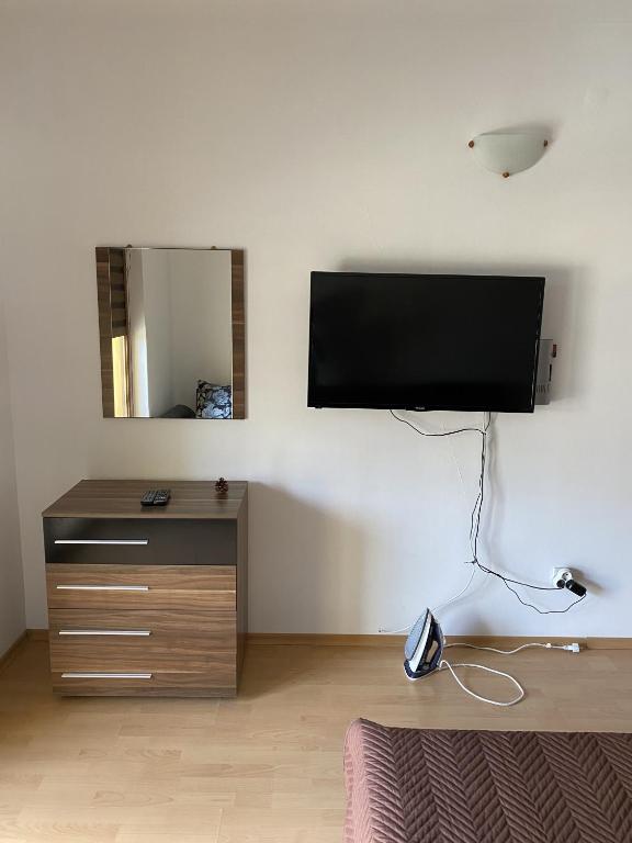 A television and/or entertainment centre at Blue Summer
