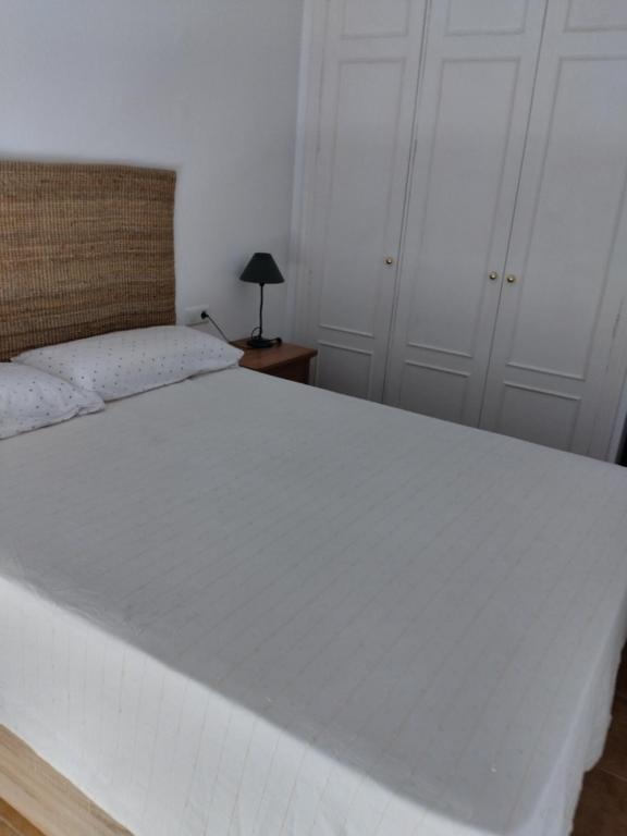 Postel nebo postele na pokoji v ubytování ADOSADO CAMPO DE GOLF