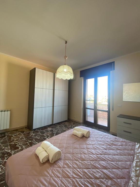 Ένα ή περισσότερα κρεβάτια σε δωμάτιο στο Rao's airport apartment