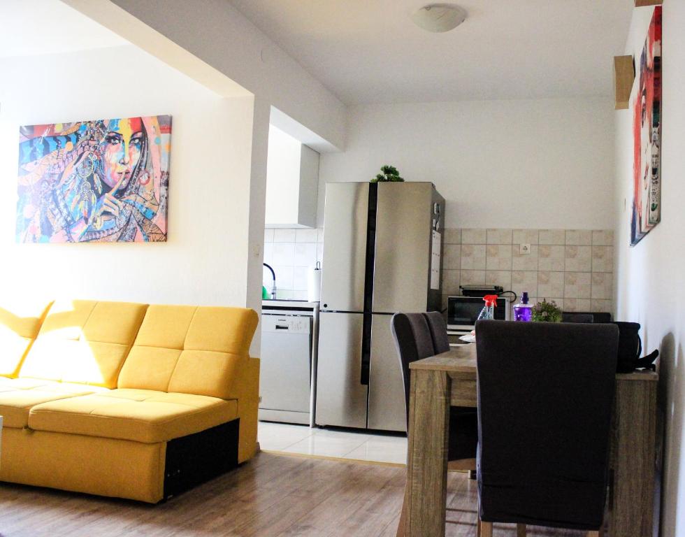 Kuchyň nebo kuchyňský kout v ubytování Apartman T&D