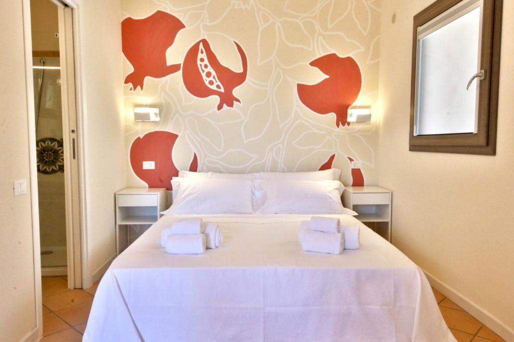 Posteľ alebo postele v izbe v ubytovaní Dolcevita Egadi Eco Resort