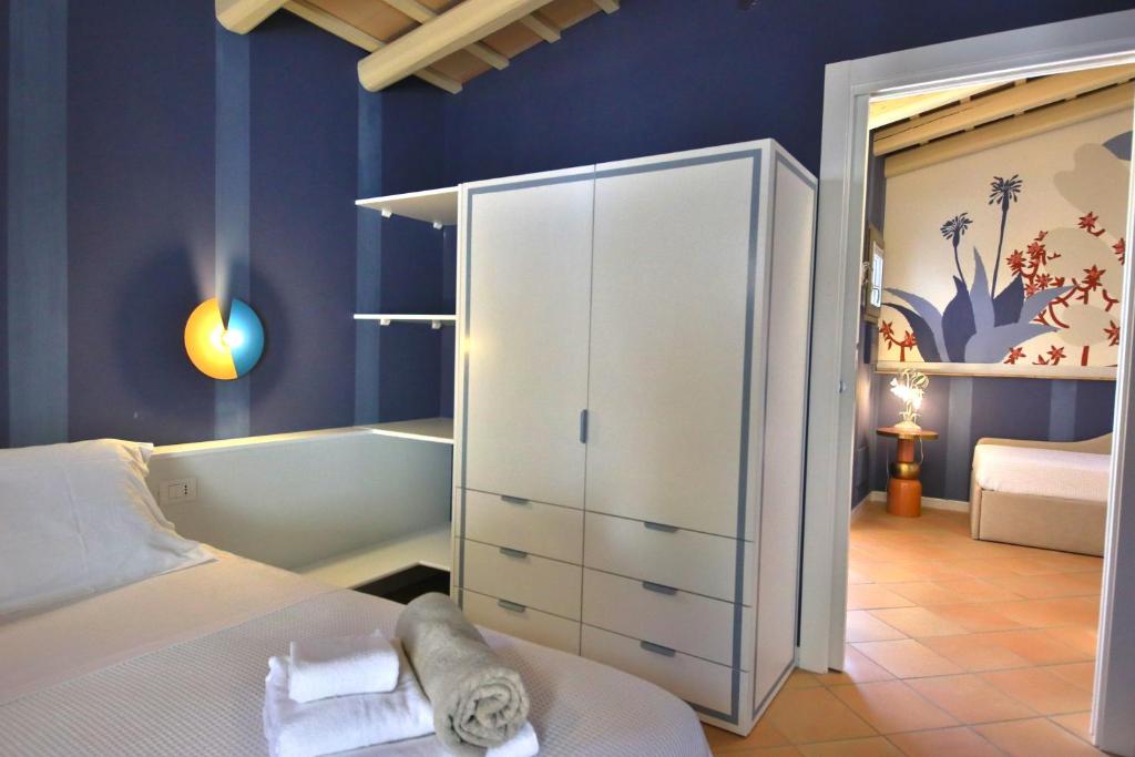 Posteľ alebo postele v izbe v ubytovaní Dolcevita Egadi Eco Resort