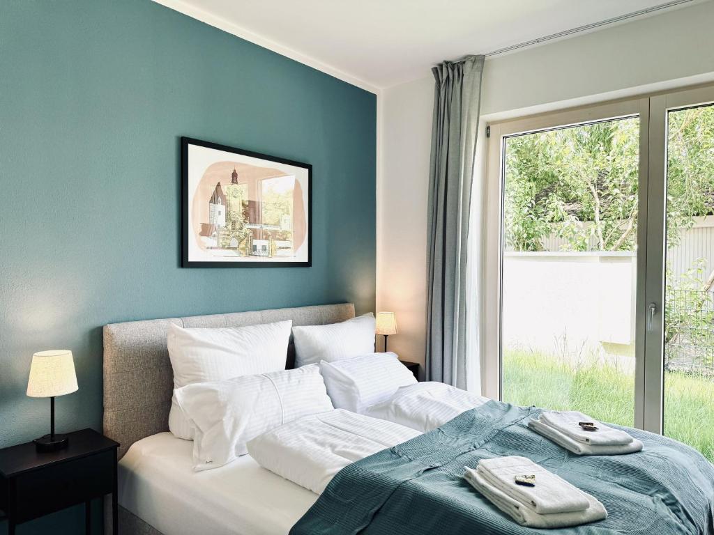 E&K living - design Apartments - SKY-TV - Audi - IN village - free parking - Appartement De Luxe 2 Chambres Avec Vue Sur Jardin