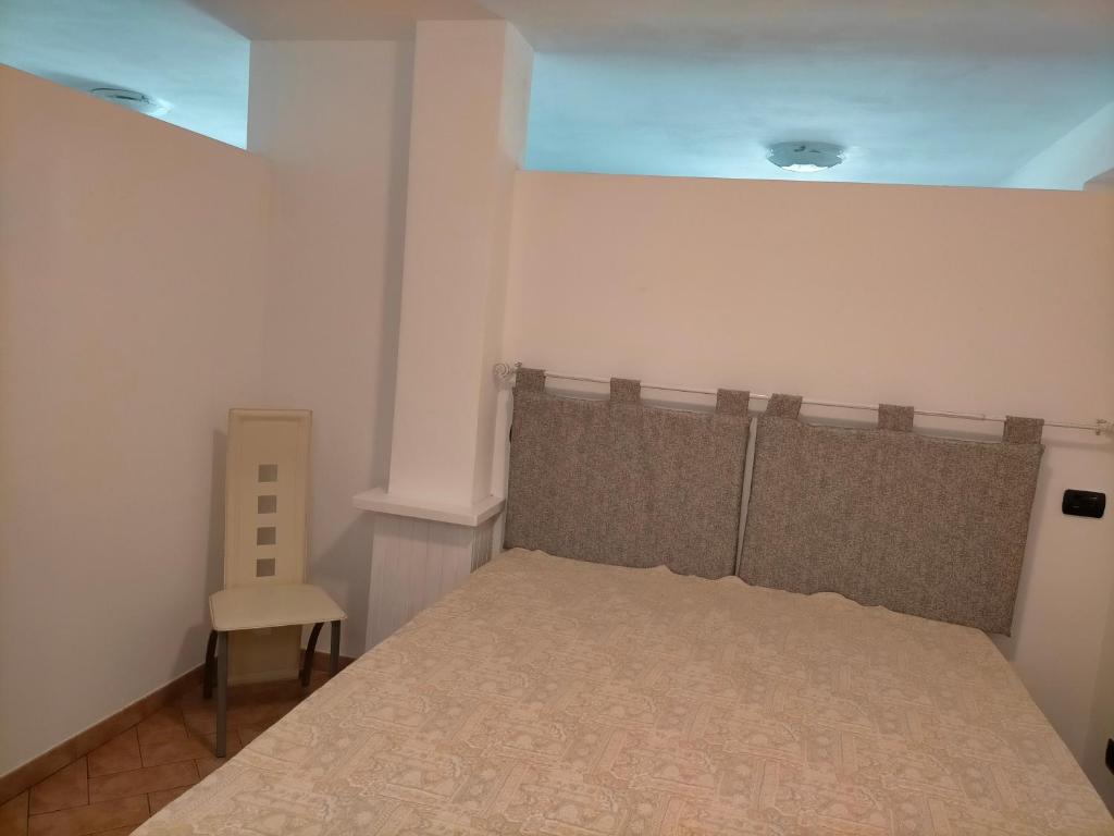 Postel nebo postele na pokoji v ubytování CASA ELGA