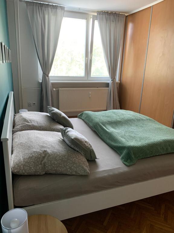 Postel nebo postele na pokoji v ubytování Victory apartmán
