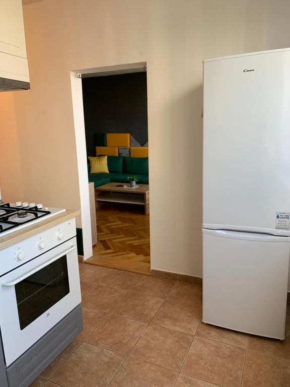 Kuchyň nebo kuchyňský kout v ubytování Victory apartmán