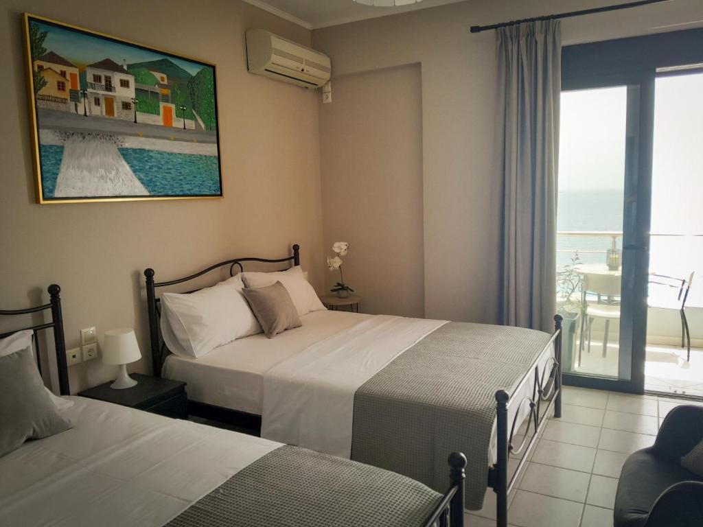 Postel nebo postele na pokoji v ubytování Anel Rooms