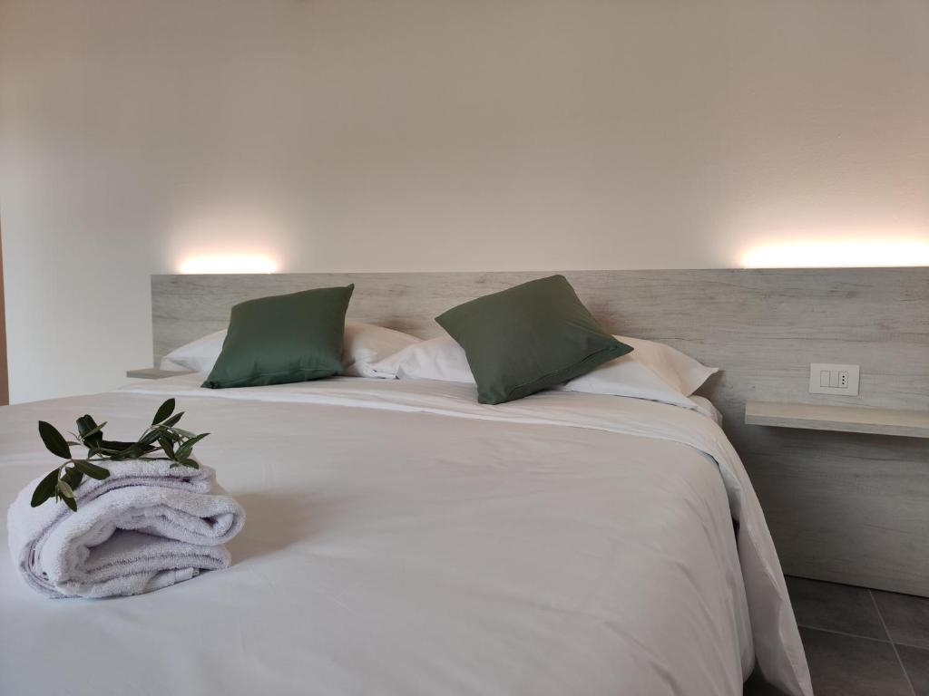 Letto o letti in una camera di Oasi degli Ulivi