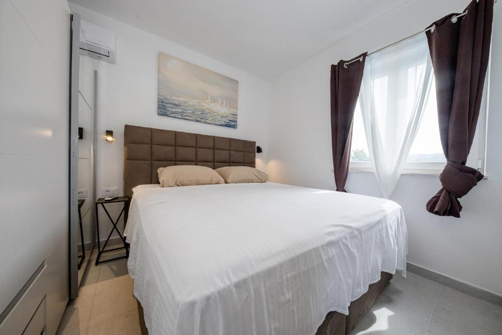Postel nebo postele na pokoji v ubytování Villa Silente