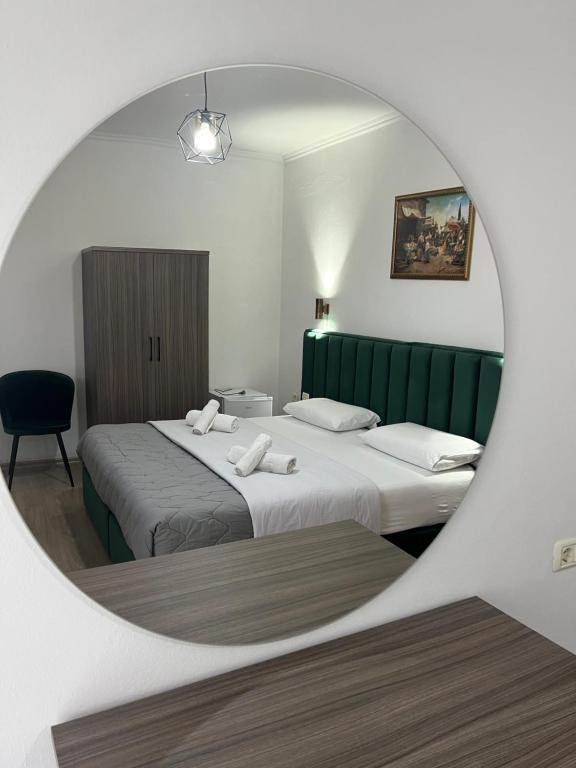 Postel nebo postele na pokoji v ubytování Hotel Floga