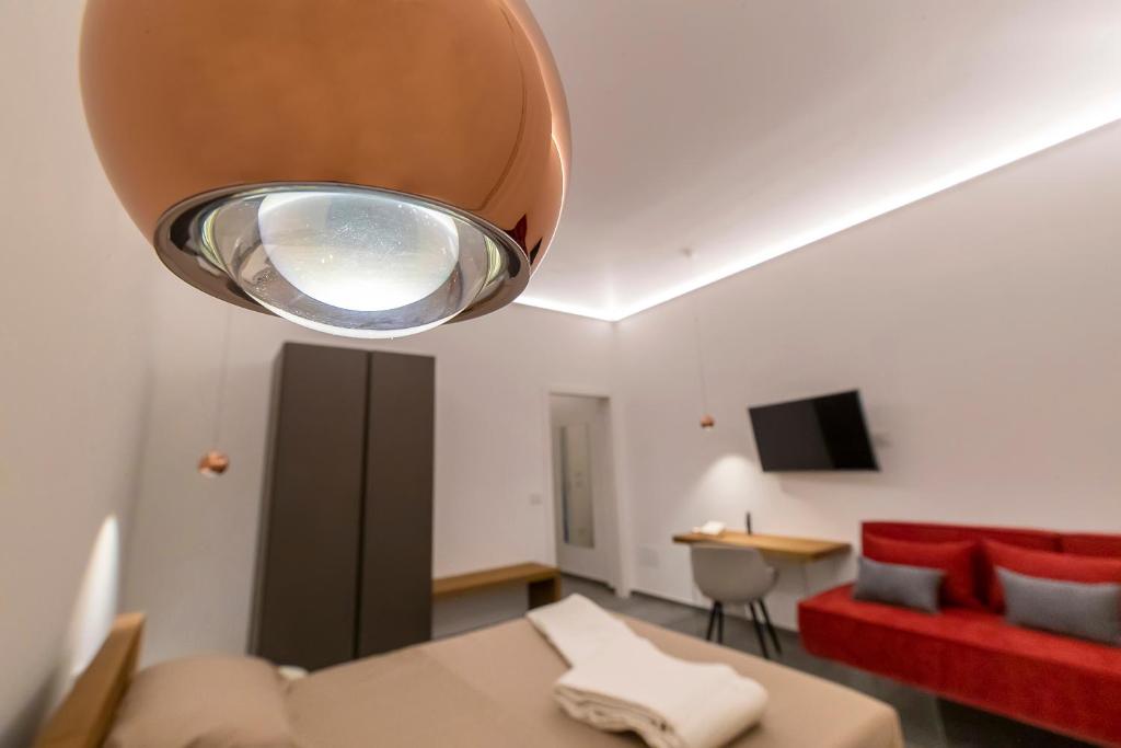 Televízia a/alebo spoločenská miestnosť v ubytovaní 32Venti Comfort Apartments Trapani