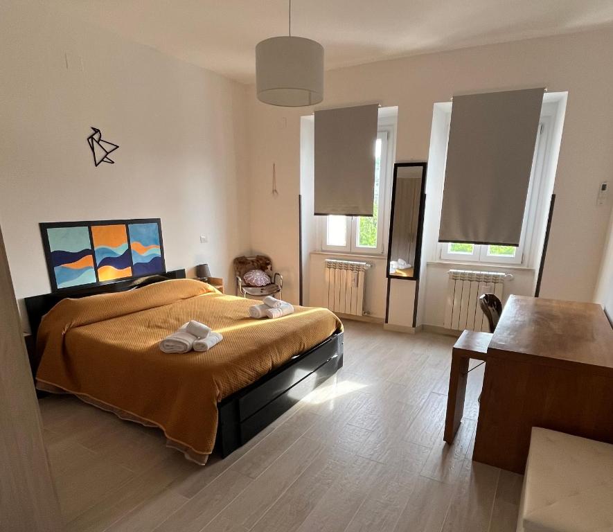 Giường trong phòng chung tại Alla Posta Family House