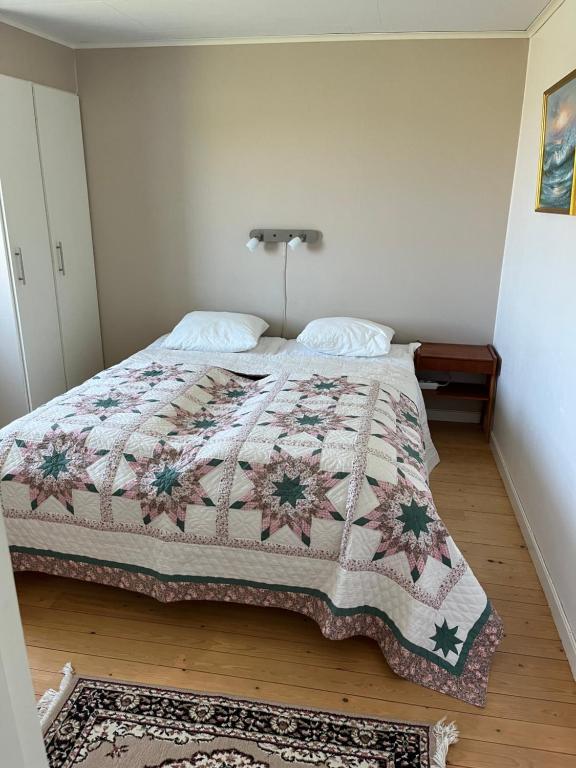 Postel nebo postele na pokoji v ubytování Strandängen