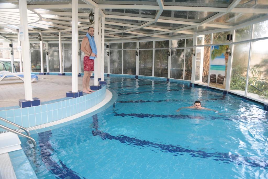 Bazén v ubytování Portaluna Hotel & Resort nebo v jeho okolí