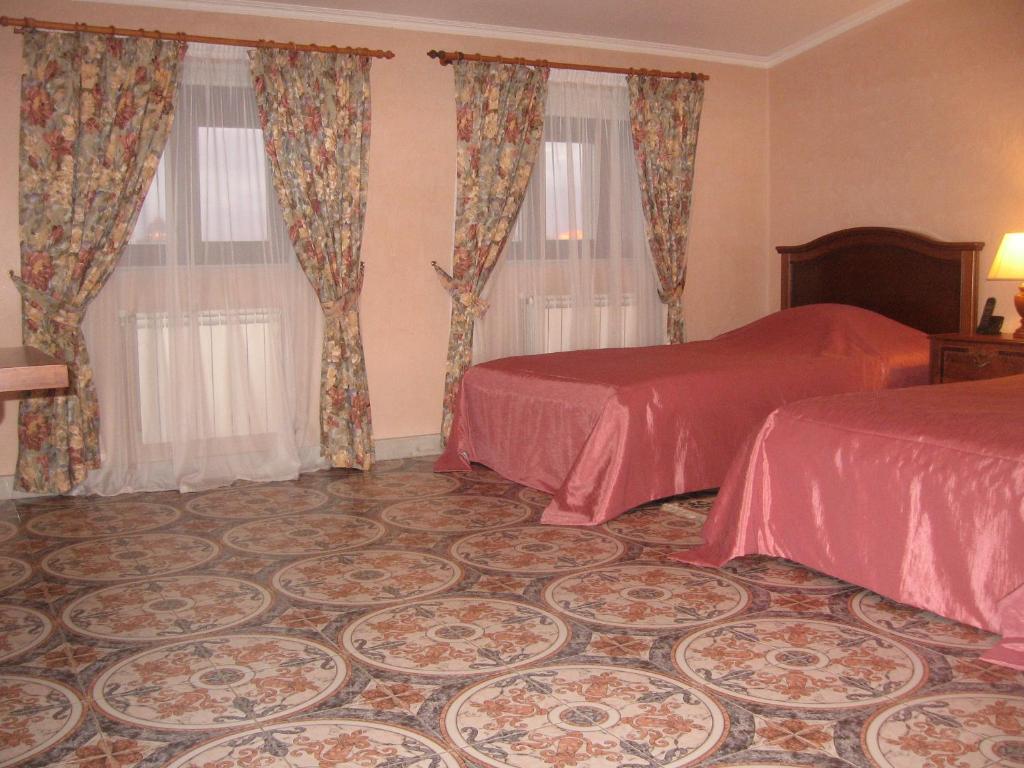 Postel nebo postele na pokoji v ubytování Giuseppe Hotel