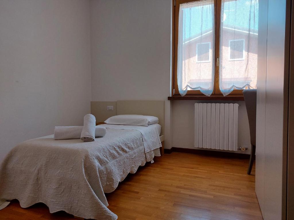 Łóżko lub łóżka w pokoju w obiekcie Le Betulle Affittacamere