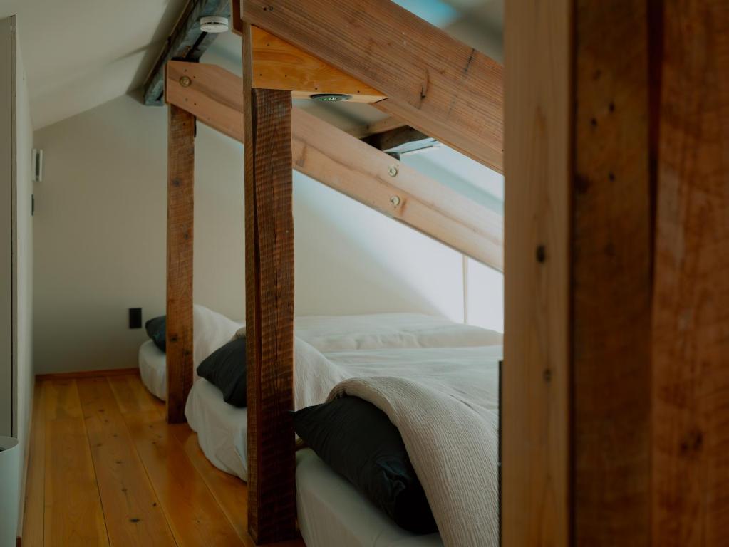 Postel nebo postele na pokoji v ubytování HOSTEL perch