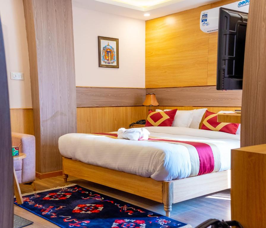 Postel nebo postele na pokoji v ubytování Hotel Yakroo Manang