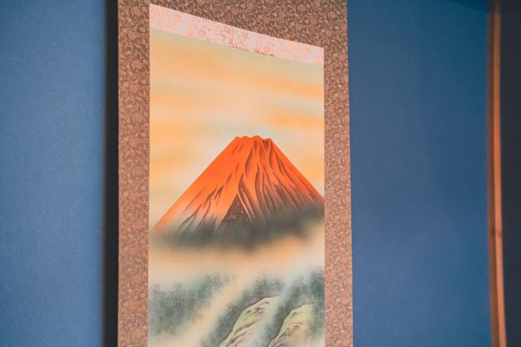 a painting of a mountain with a foggy mountain at New! Kamata close Haneda AP - Traditional & Hot Spring in Tokyo