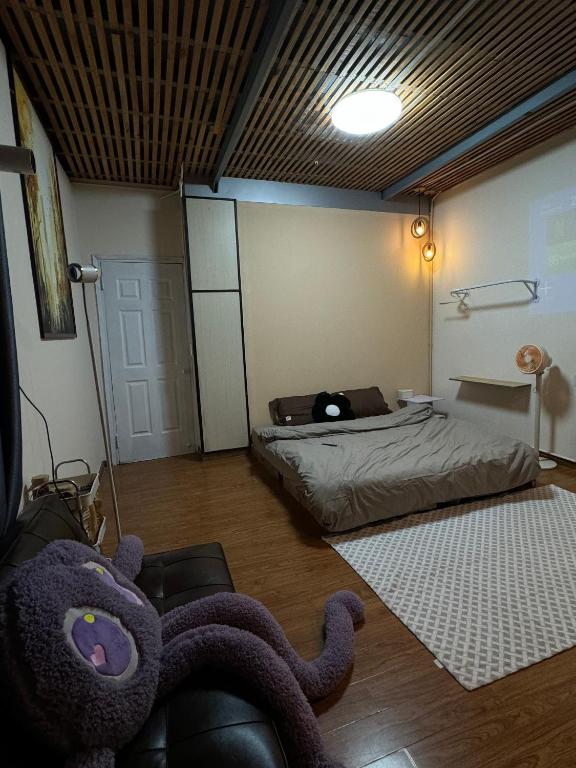 Postel nebo postele na pokoji v ubytování Baos Home