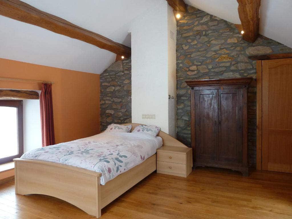 Postel nebo postele na pokoji v ubytování gîte Le cheval ardennais