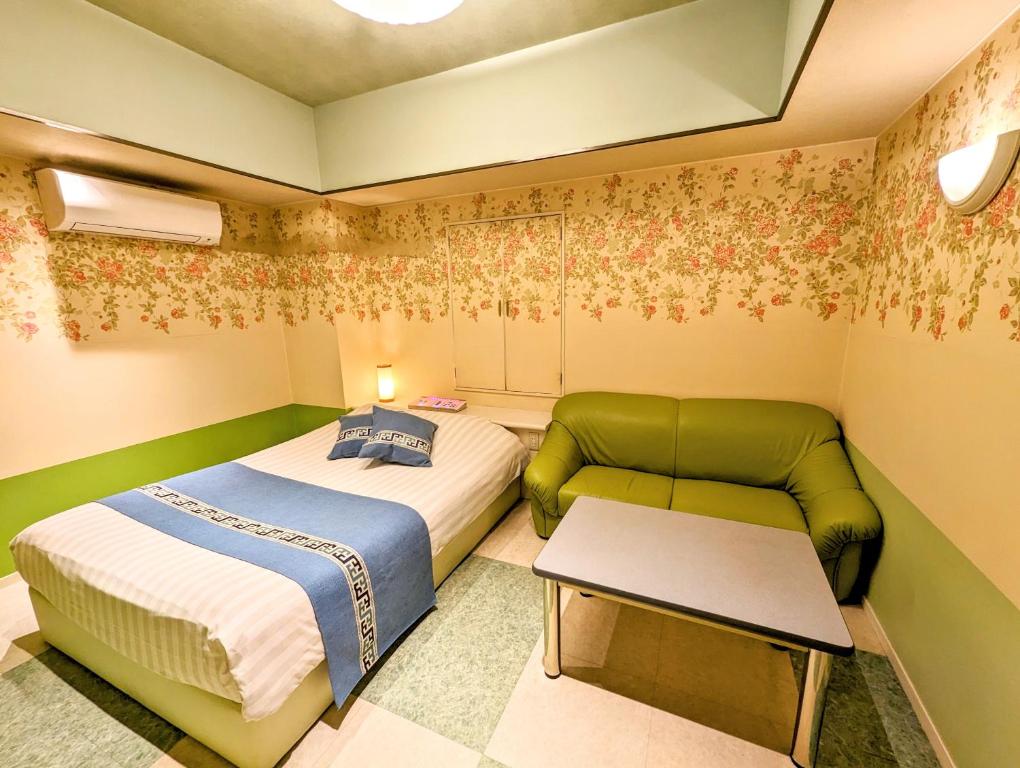Postel nebo postele na pokoji v ubytování Hotel P'sResort Adults only 大人専用