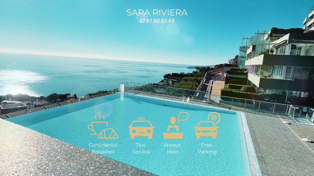 カップ・ダイユにあるSARA RIVIERA Costa Planaの海辺の建物の上にスイミングプールがあります。