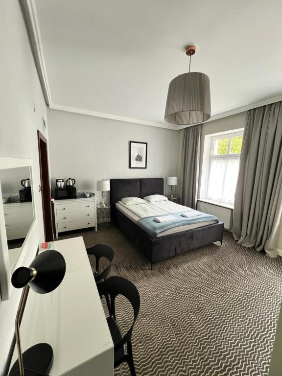 Postel nebo postele na pokoji v ubytování CIENISTA 7 APARTMENTS