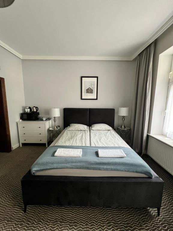 Postel nebo postele na pokoji v ubytování CIENISTA 7 APARTMENTS