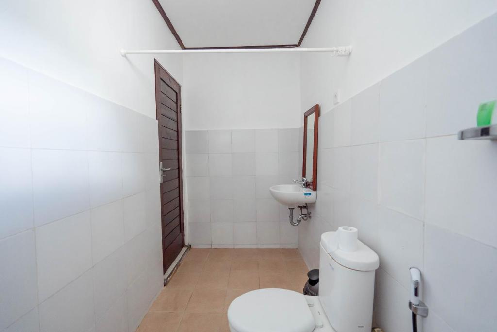 Koupelna v ubytování Brisk Homestay Uluwatu RedPartner