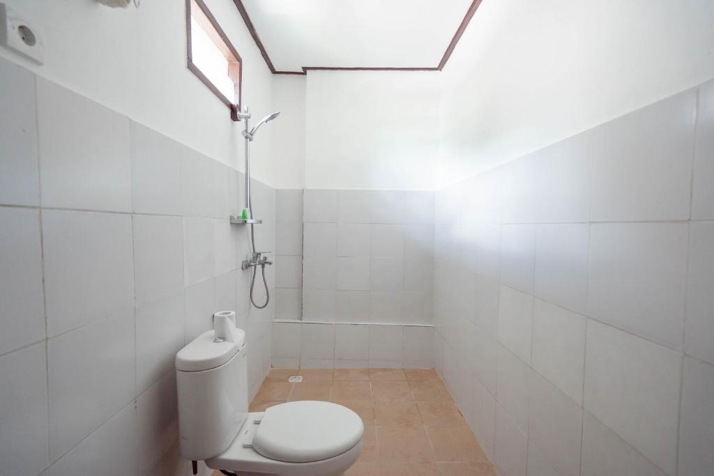 Koupelna v ubytování Brisk Homestay Uluwatu RedPartner