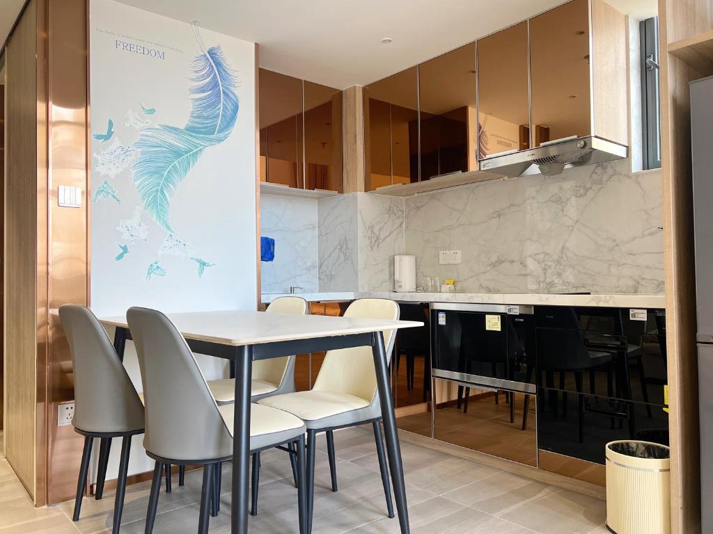 Kuchyň nebo kuchyňský kout v ubytování Zhongshan Perth Hotel Apartment - Shiqi Wanxianghui Branch
