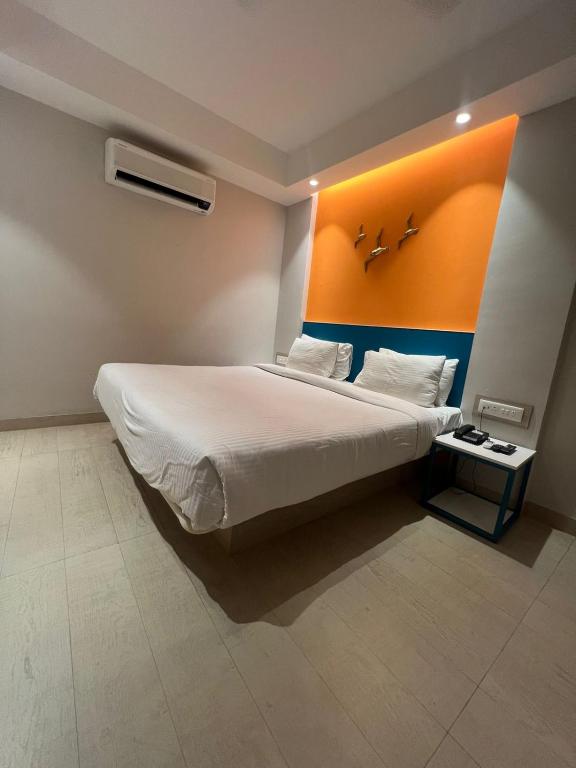 Postel nebo postele na pokoji v ubytování Sparrow Hotel Managed by Siara Sariska Alwar