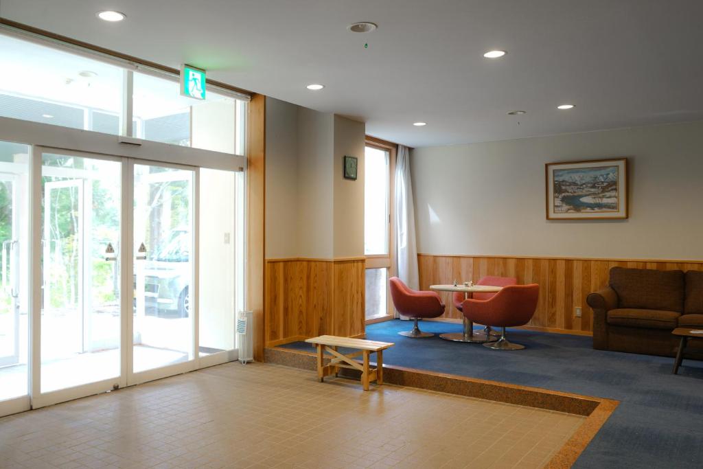 Posezení v ubytování Hotel Bauhinia ホテルバウヒニア