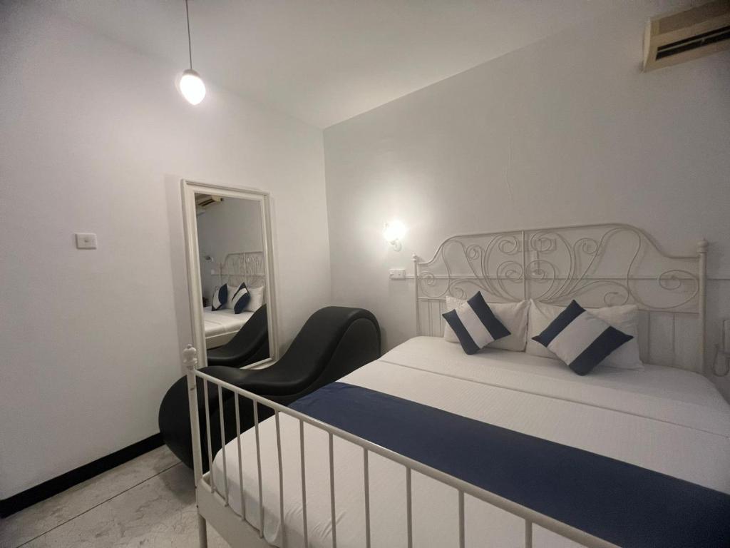 Postel nebo postele na pokoji v ubytování Beverly Villa